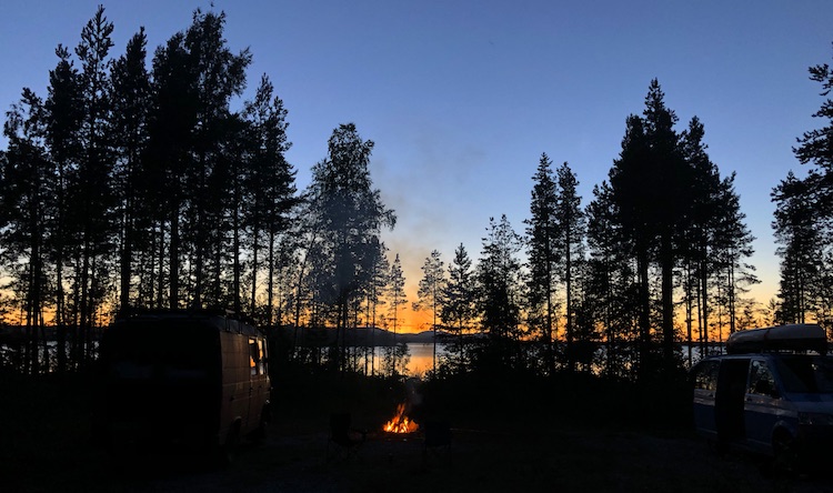 Twilight and a campfire at lake Storsjön