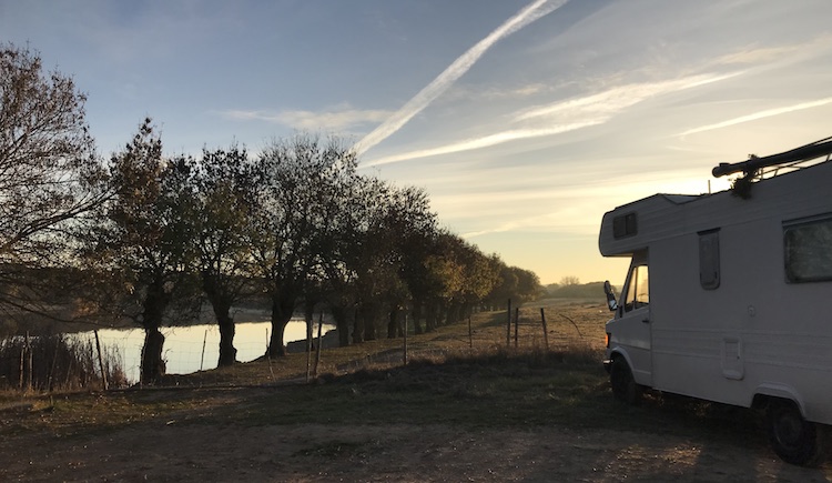 Van near tiny lake