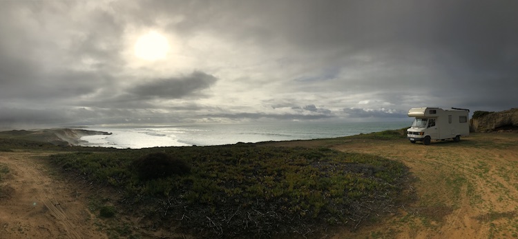 Parked van on a cliff