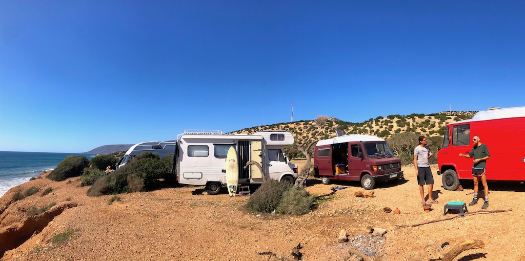 Four Mercedes vans on the cliffs