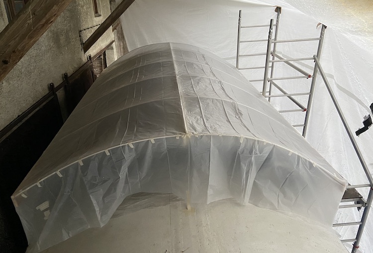 Roof protected by a plastic cover