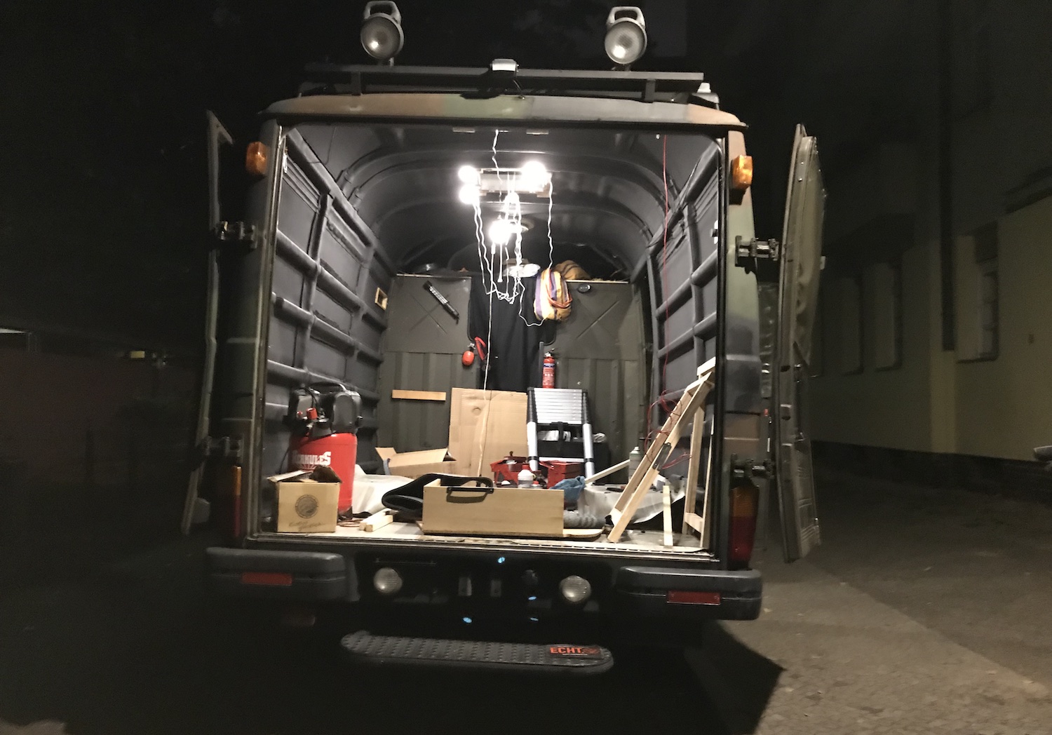 Van with self-adhesive insulation