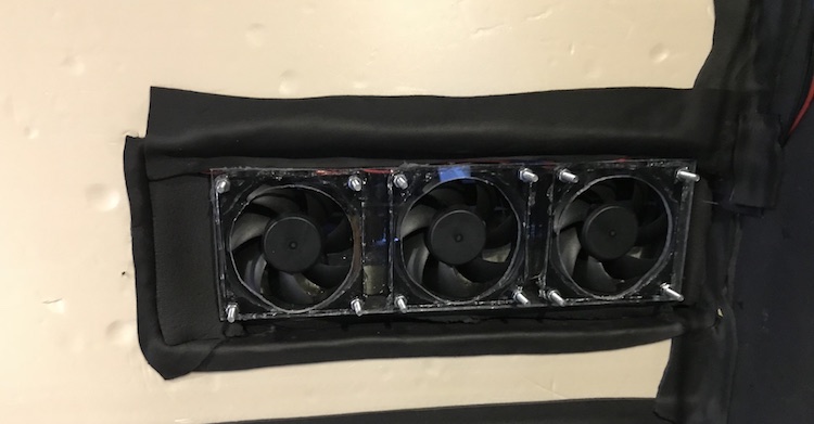 Sealed and insulated socket holding the fans