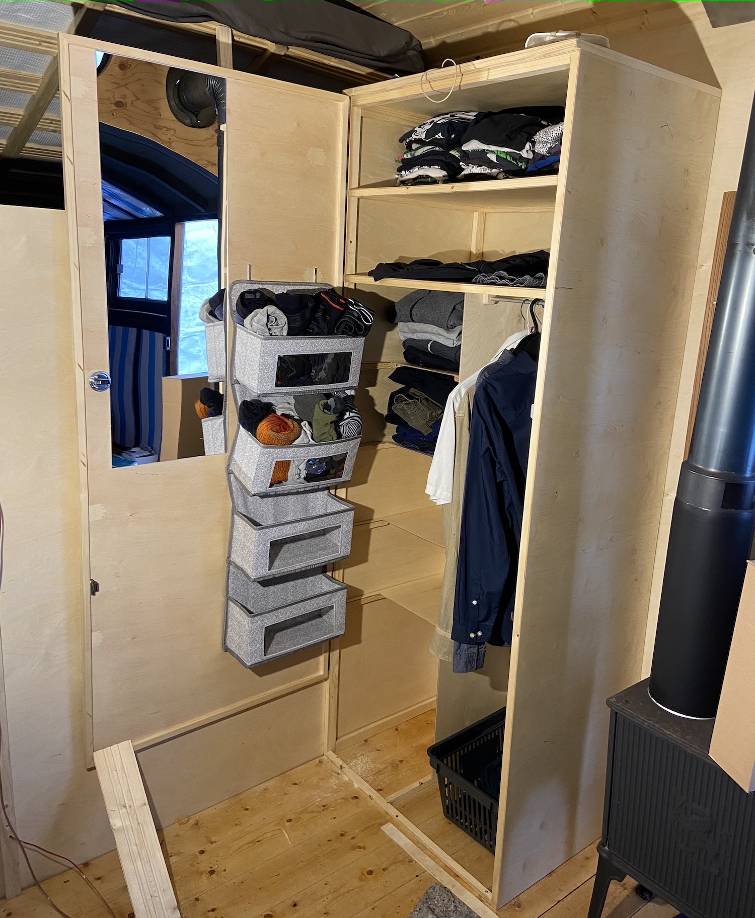 Installing a mirror into the door of the wardrobe