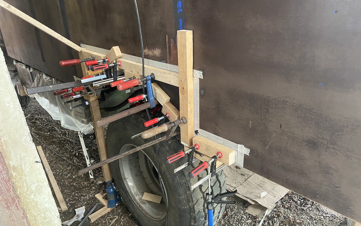 Adhering new wood around the wheelhouse