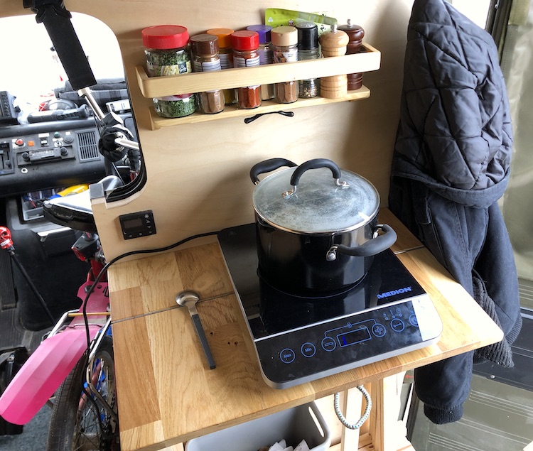 Foldable table with the electric cooker