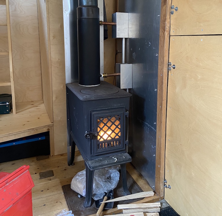 Wood stove heating up the liquid