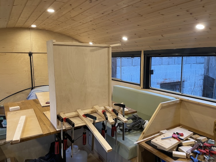 Gluing drawer boxes together inside the warm cabin