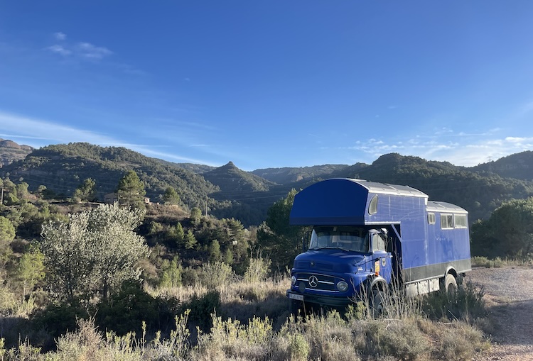 Truck parked in the greenery near Mura