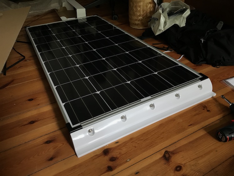 100 Wp solar panel mounted on spoiler