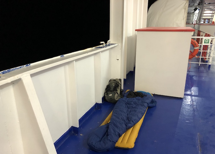 Sleeping bag on deck of the ferry