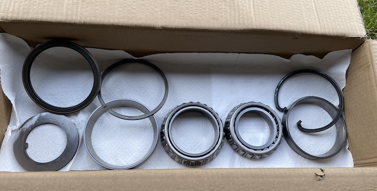 Cleaned wheel bearings, bearing races, spacer rings, snap ring, and shaft seal