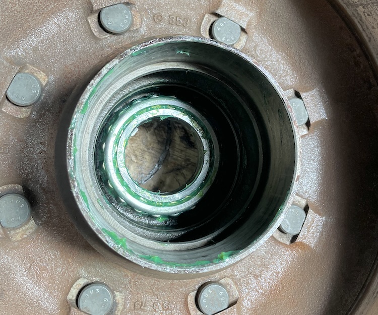 Greased outer wheel bearing
