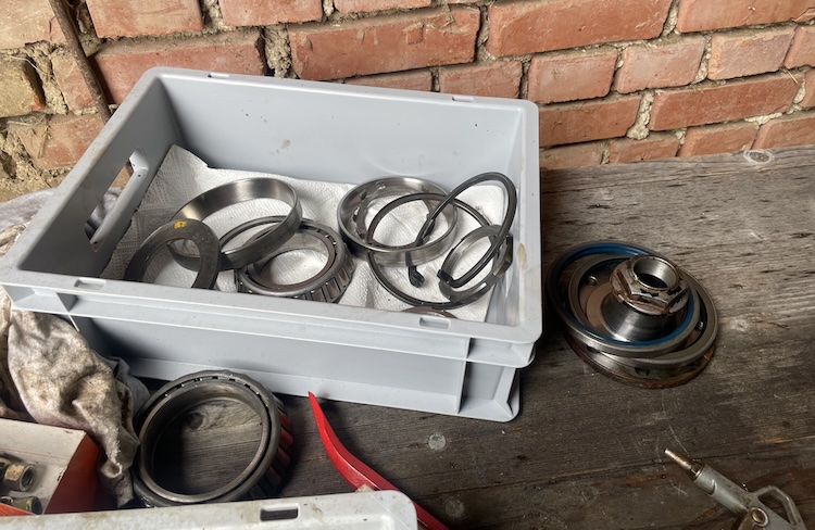 Cleaned bearings, outer bearing races, spacers, and so on