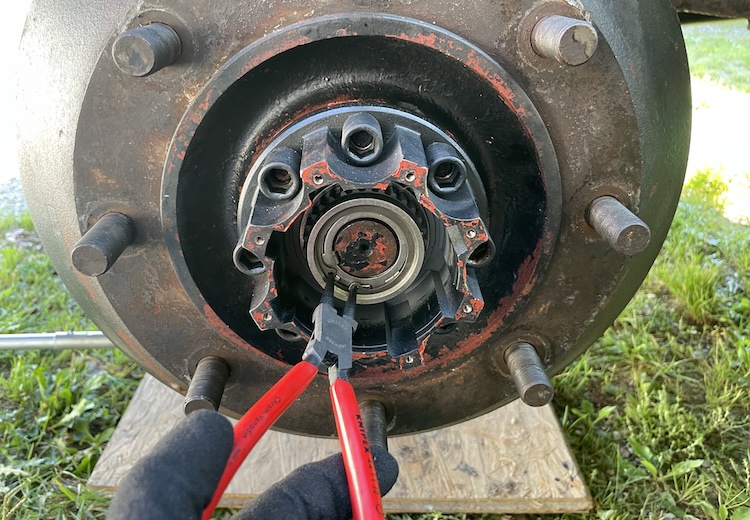 Removing the snap ring from the freewheel hub