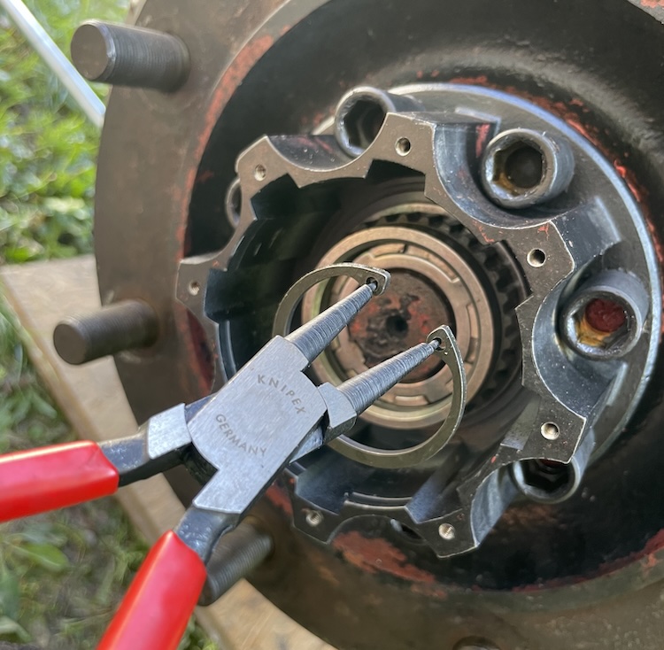 Adding the snap ring to the freewheel hub