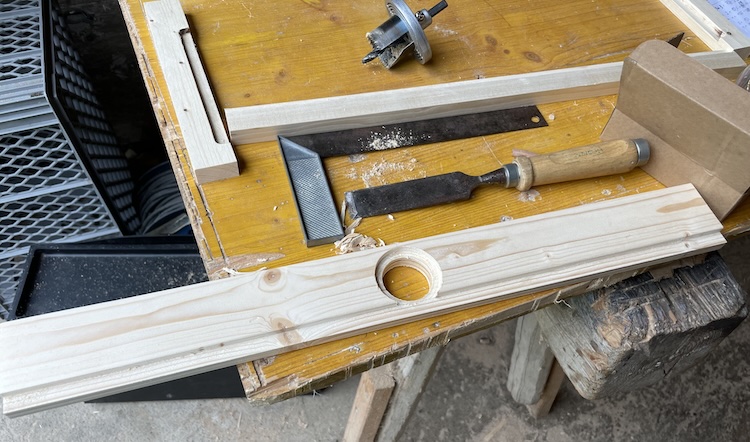 Chiseling out the cutouts for the pull locks