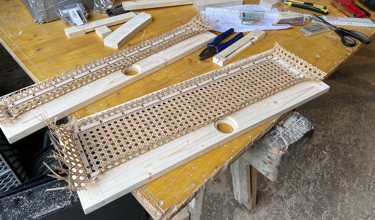 Clamping the Vienna straw matting into the front panels