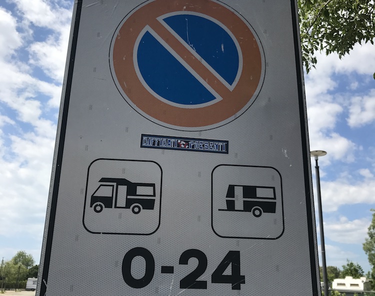 Street sign prohibiting camper vans