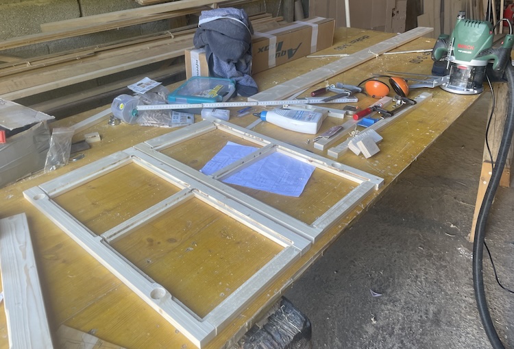 Milling the cabinet door frames and bonding them with dowels