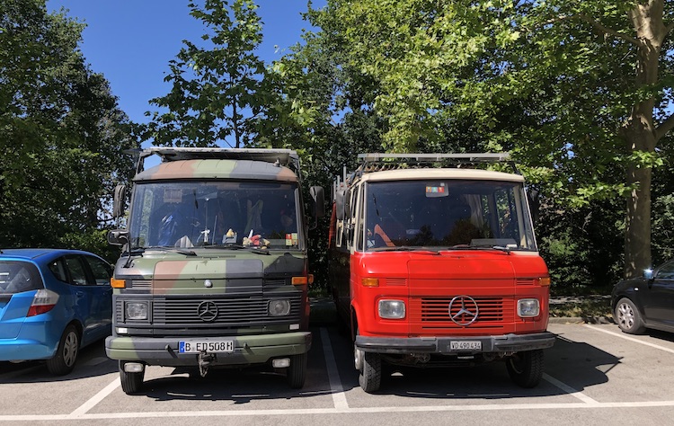 Two Mercedes T2s parked in Lausanne